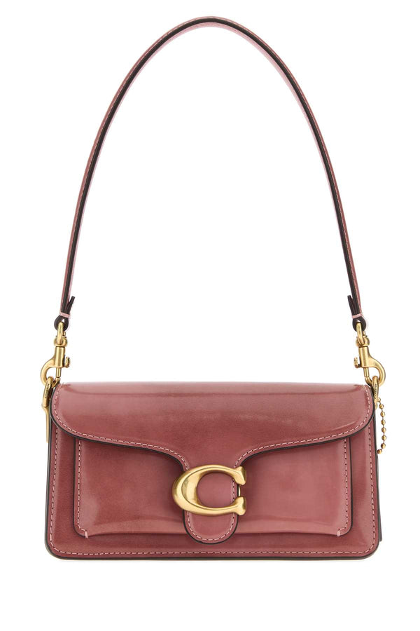 Coach New York Shoulder Exterior: 100% Leather; Lining: 100% Fabric; Hardware: Antiqued golden metal shoulder bag in pink