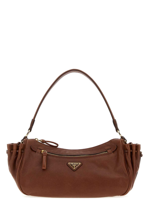 Prada Exterior: 100% Calf shoulder bag in brown