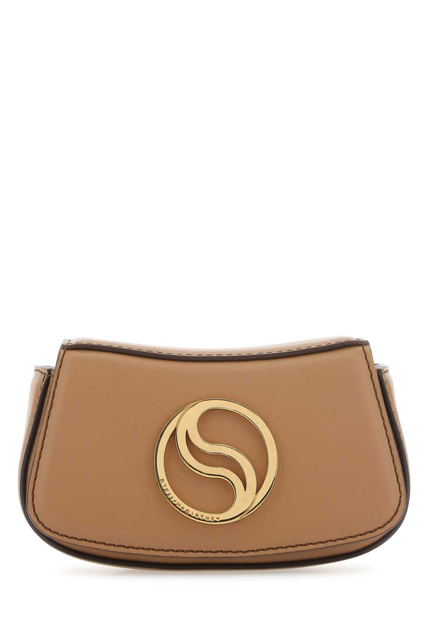 Stella McCartney Exterior: 100% Altermat; Lining: 100% Fabric; Finishing: Golden metal clutch in beige