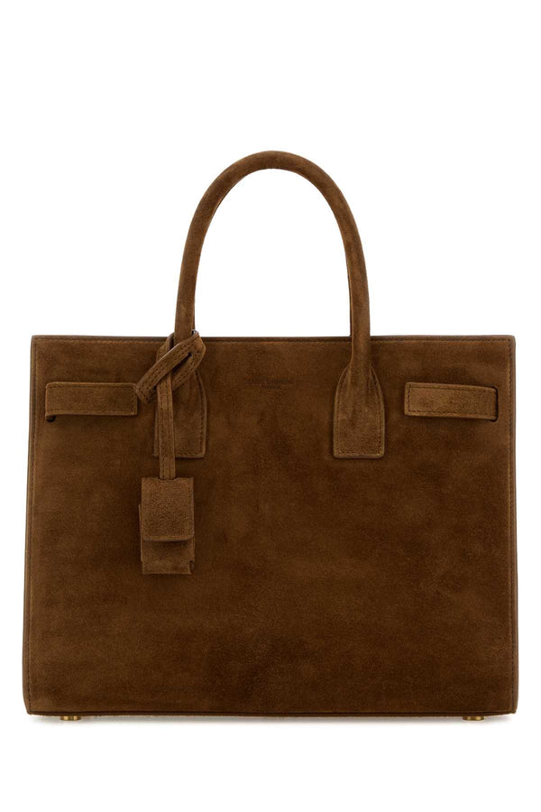 Saint Laurent Baby Exterior: 100% Calf Lining: 100% Leather Finishing: Antiqued golden metal shoulder bag in brown