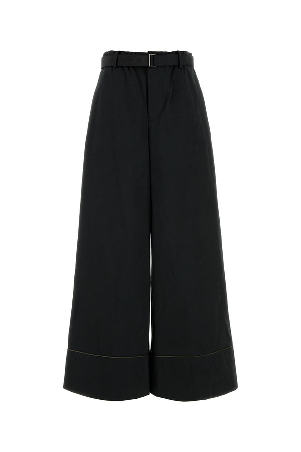 Sacai Polyester 60% trousers in black
