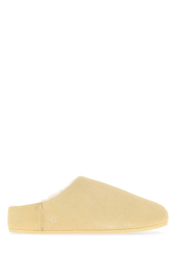 UGG Exterior: 100% Suede; Interior: 100% Shearling; Sole: UGGplush™ slipper in beige