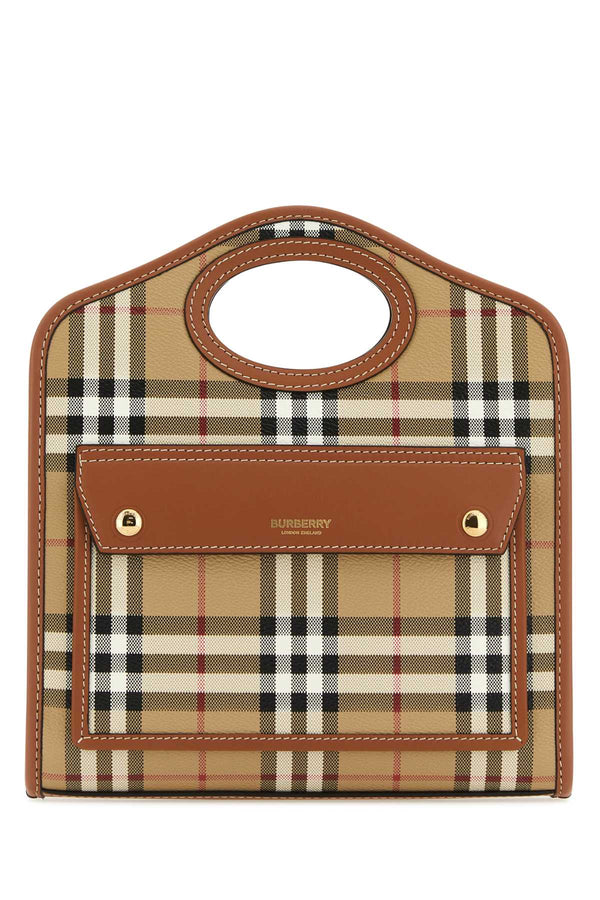 Burberry Exterior: 69% Polyurethane top handle bag in brown