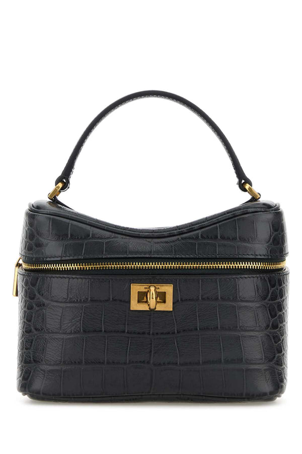 Balenciaga Vanity Exterior: 100% Calf Leather (crocodile-embossed); Interior: 100% Fabric; Hardware: Antiqued golden metal shoulder bag in black