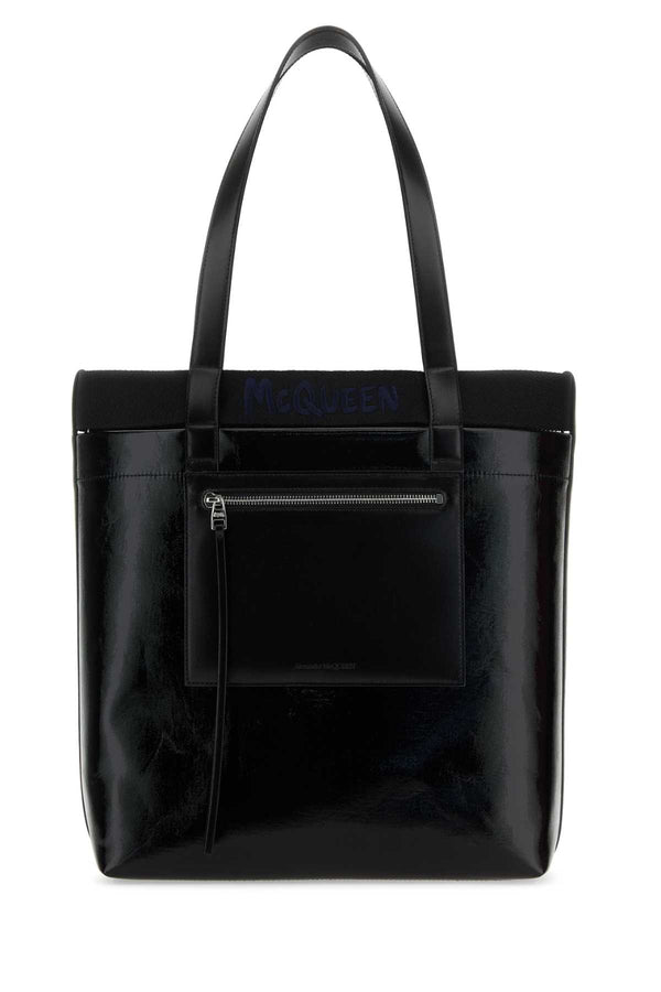 Alexander McQueen Exterior: 100% Fabric; Lining: 100% Leather; Finishing: Silver metal tote bag in black