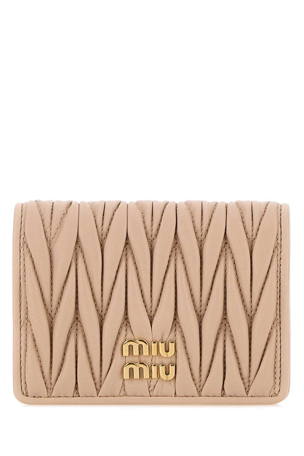 Miu Miu Exterior: 100% Leather; Finishing: Golden metal wallet in beige