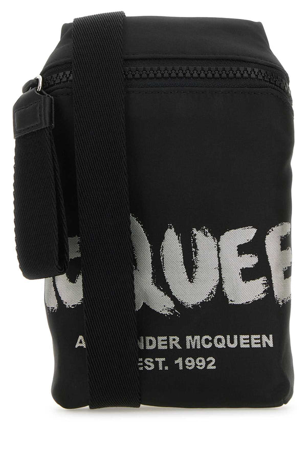 Alexander McQueen Exterior: 100% Fabric; Lining: 100% Fabric; Hardware: Silver metal shoulder bag in black