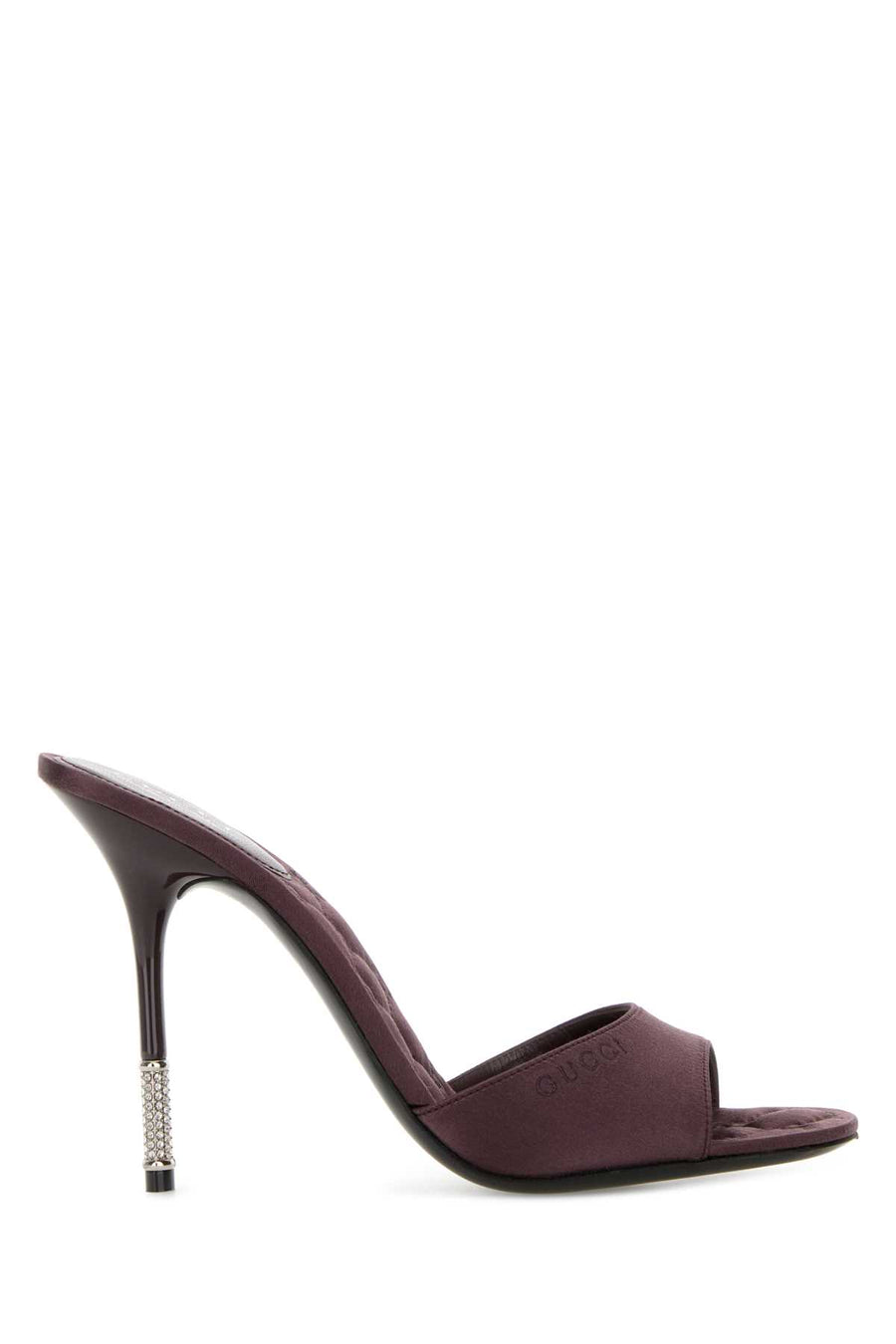 Gucci Upper Exterior: 100% Fabric; Interior: 100% Fabric; Sole: Leather mule heel in purple