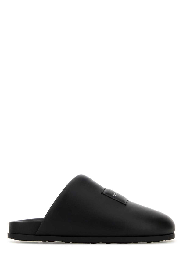 Givenchy Puffy Exterior: 100% Lamb Interior: 100% Leather Sole: Rubber slipper in black