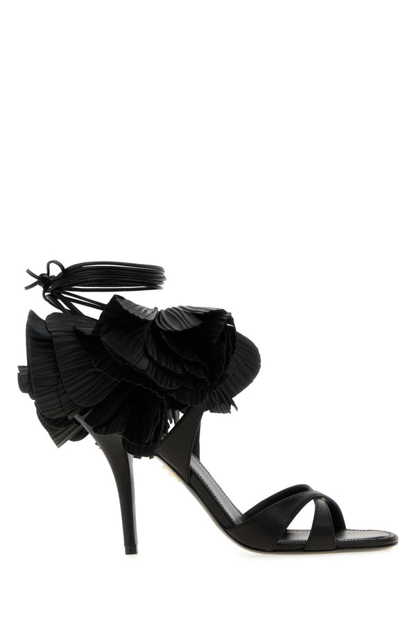 Ferragamo Nero Exterior: 100% Lamb leather. Lining: 100% Leather. Sole: Leather sandal heel in black