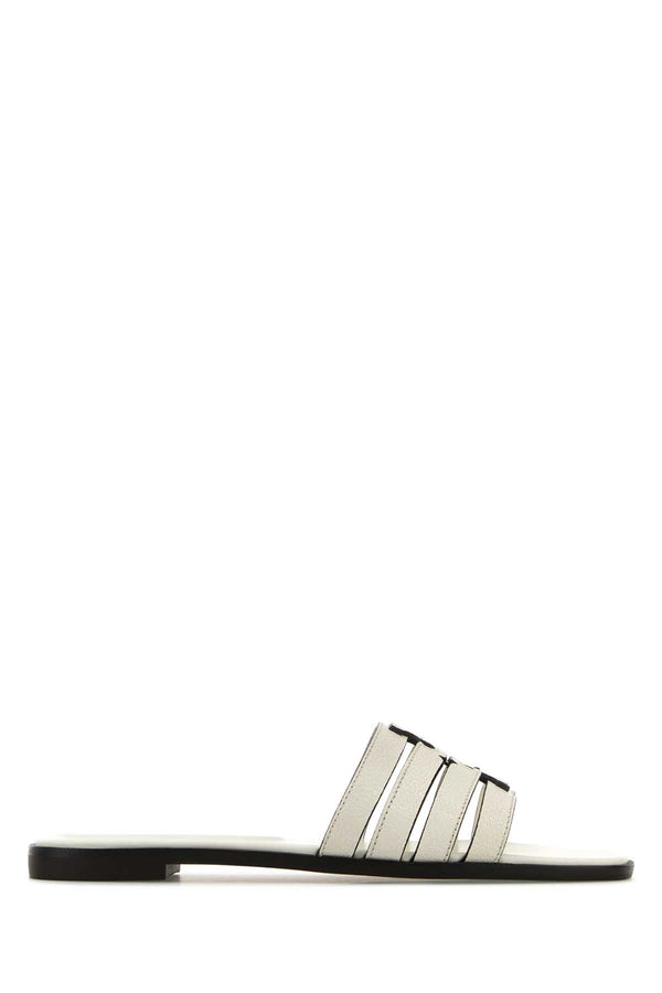 Tory Burch Cage Upper: 100% Caprine Leather; Lining: 60% Bovine Leather slide in white