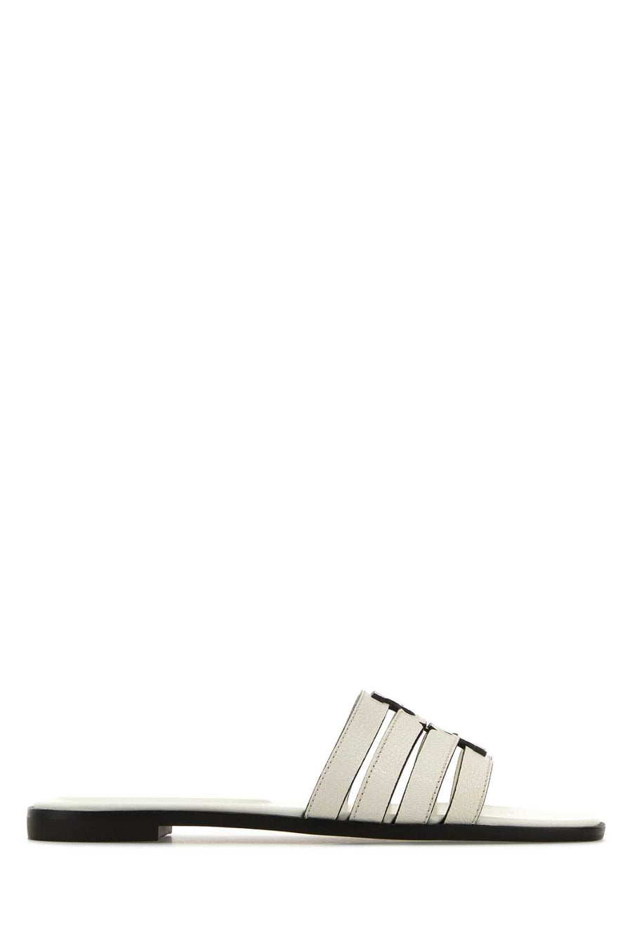 Tory Burch Cage Upper: 100% Caprine Leather; Lining: 60% Bovine Leather slide in white