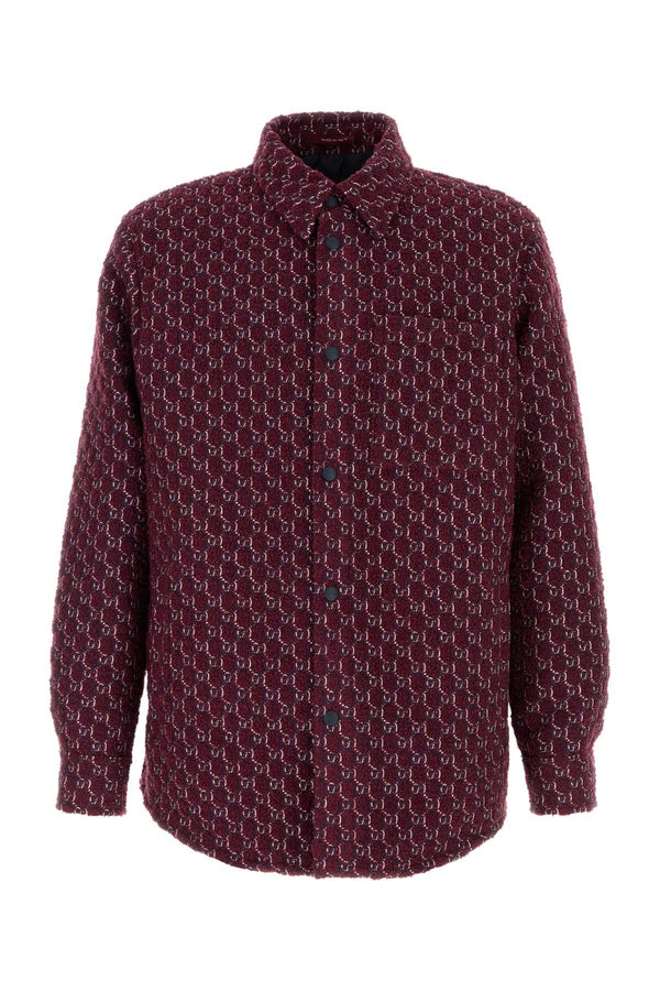 Gucci Jacket Exterior: 58% Wool 42% Polyester; Lining: 100% Polyester; Padding: 100% Polyester jacket in burgundy