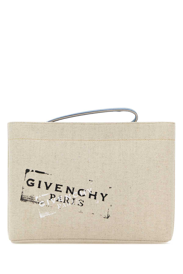 Givenchy Pouch Exterior: 58% Cotton 42% Linen Lining: 100% Leather Finishing: Silver metal clutch in beige