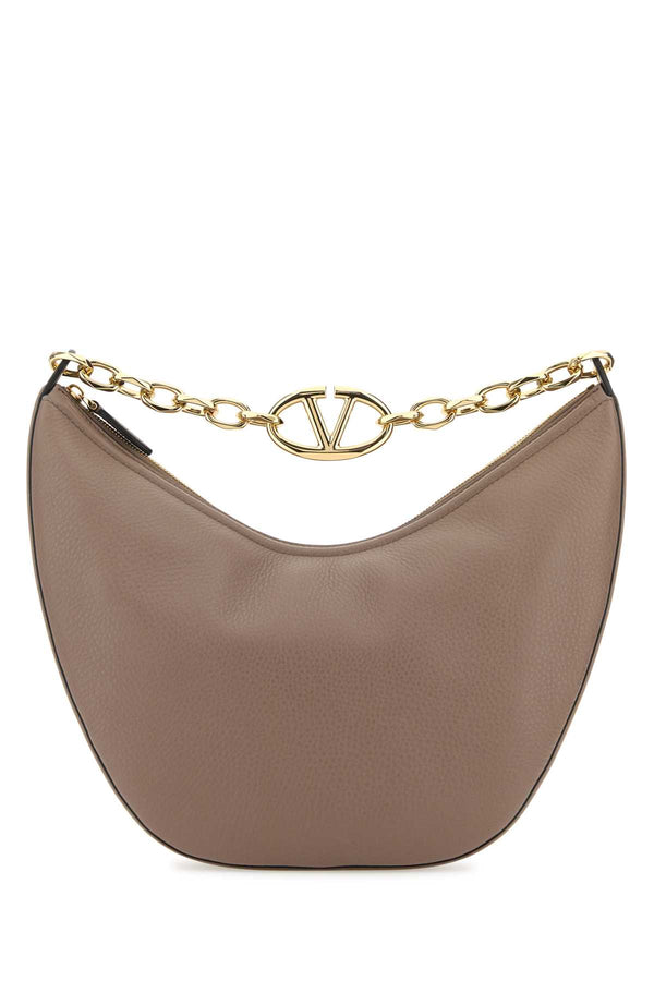 Valentino Garavani Exterior: 100% Leather; Lining: 100% Leather; Finishing: Golden metal shoulder bag in beige