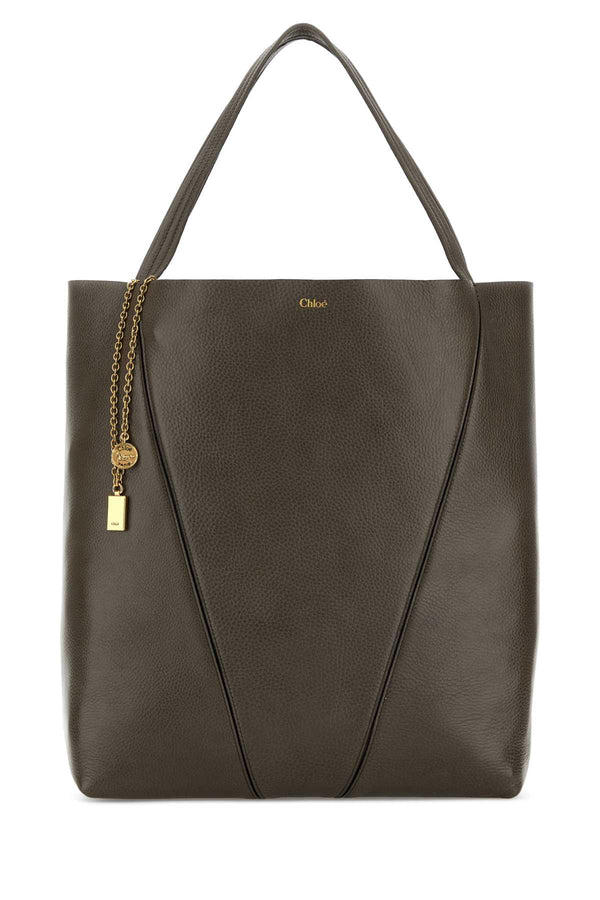 Chloé Chloé Exterior: 100% Calf Lining: 100% Leather Finishing: Antiqued golden metal shoulder bag in gray