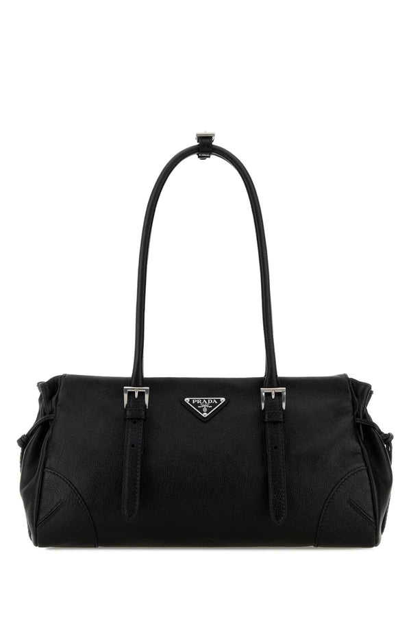 Prada Exterior: 100% Calf; Lining: 100% Leather; Finishing: Silver metal shoulder bag in black