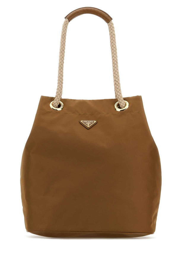Prada Exterior: Re-Nylon; Lining: Fabric; Finishing: Golden metal bucket bag in brown