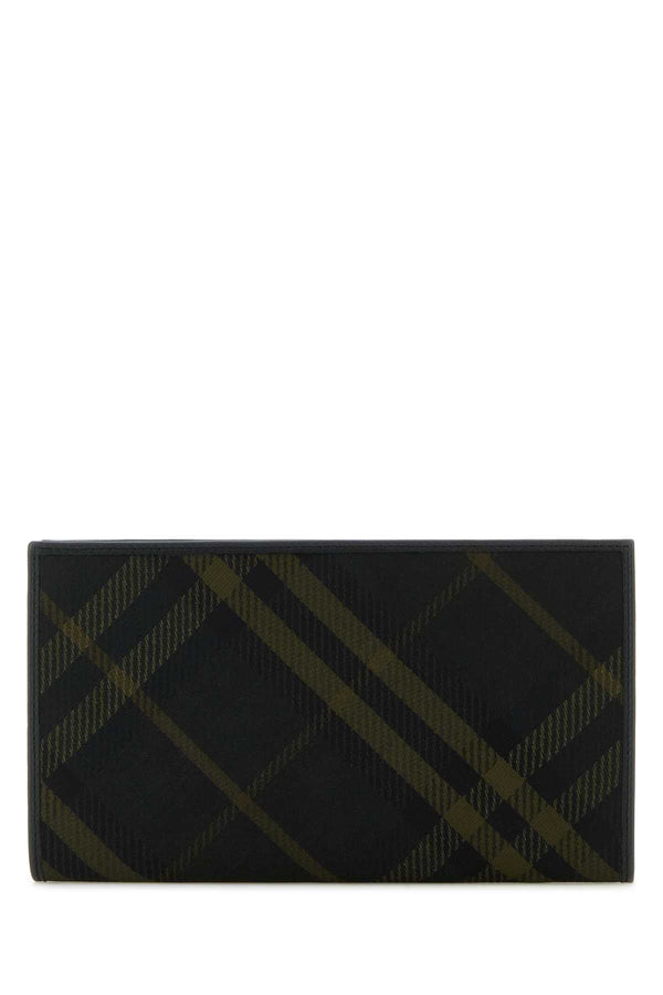 Burberry Continental Exterior: 76.5% Polyester 23.5% Cotton wallet in black