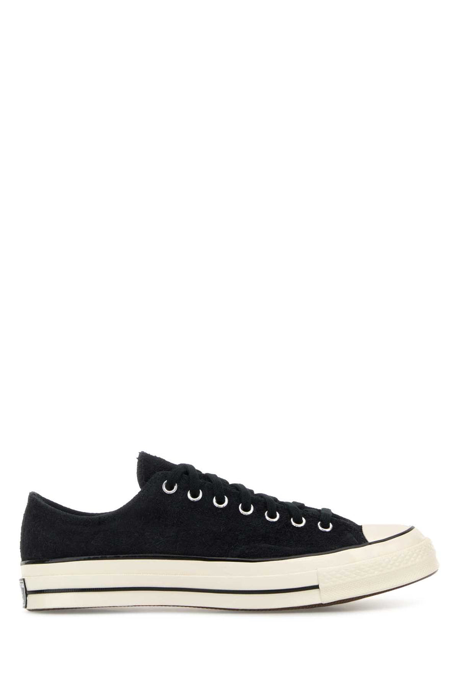 Converse Exterior: 100% Fabric; Interior: 100% Fabric; Sole: Rubber sneaker in black