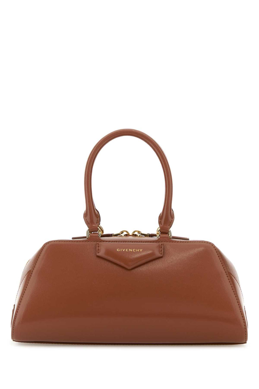 Givenchy Exterior: 100% Calf; Lining: 100% Fabric; Finishing: Golden metal top handle bag in brown