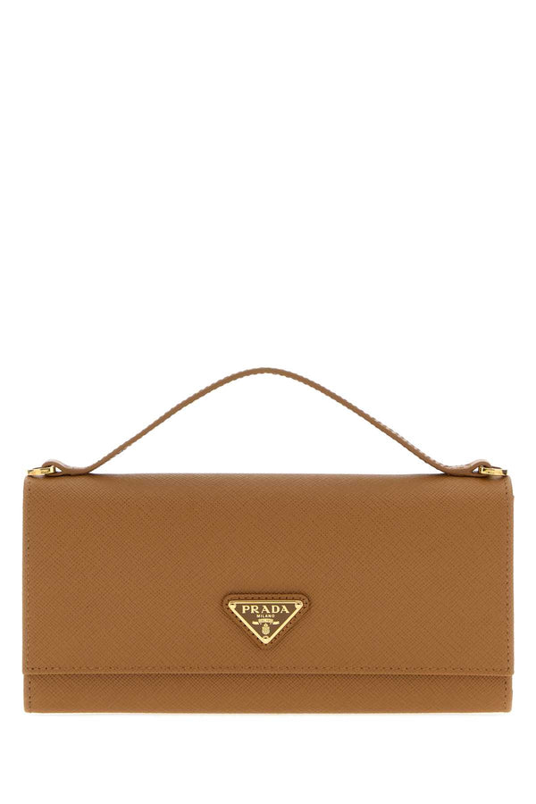 Prada Exterior: 100% Leather; Finishing: Golden metal wallet in brown