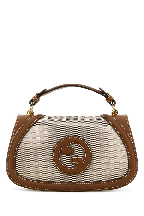 Gucci Exterior: 100% Fabric top handle bag in brown