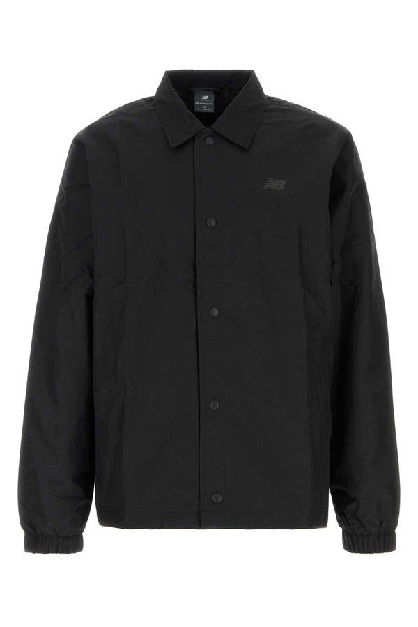 New Balance Coaches Exterior: 100% Polyester jacket in black