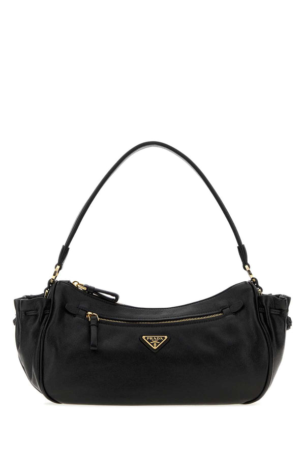 Prada Exterior: 100% Calf; Lining: 100% Fabric; Finishing: Golden metal shoulder bag in black