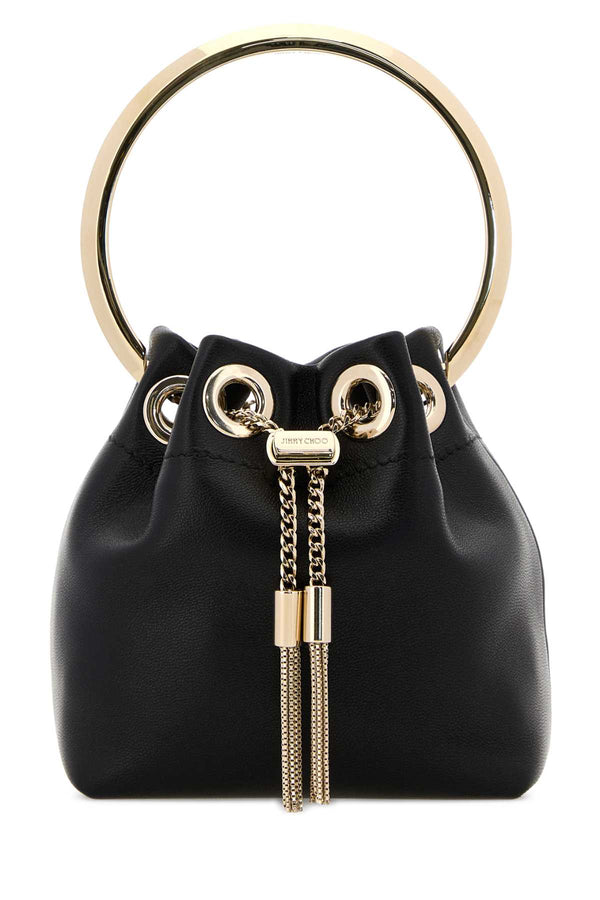 Jimmy Choo Exterior: 100% Lamb. Lining: 100% Fabric. Hardware: Platinum-tone bucket bag in black