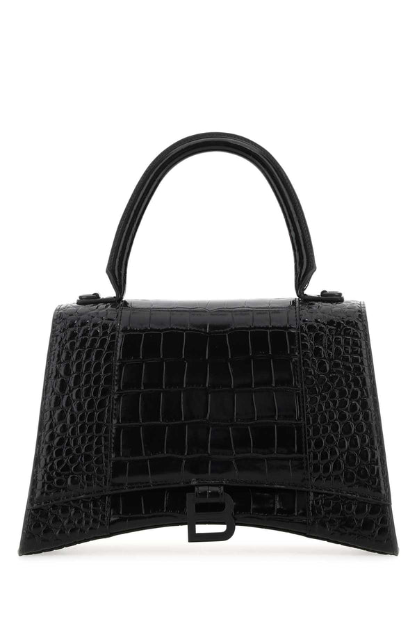 Balenciaga Exterior: 100% Calf; Interior: 100% Leather; Finishing: Antiqued silver metal top handle bag in black