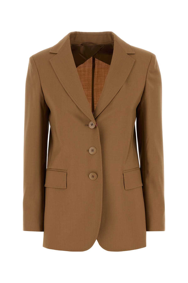 Mm Studio Exterior: 100% Virgin wool; Lining: 65% Acetate 35% Polyester blazer in camel