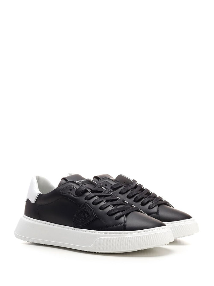 black Temple sneaker with white heel tab