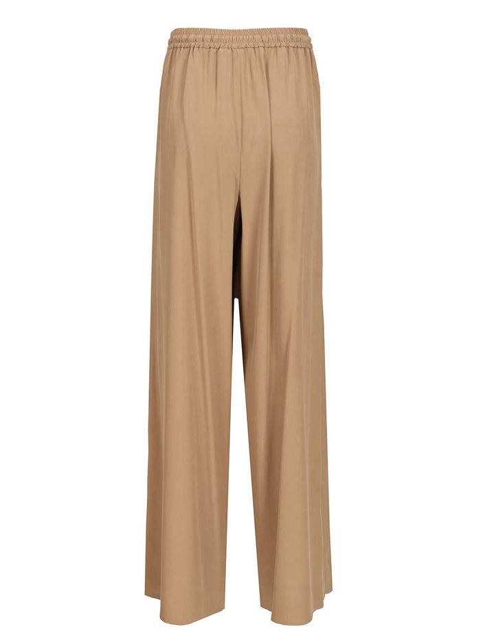 Genero wide-leg washed silk trousers Brown