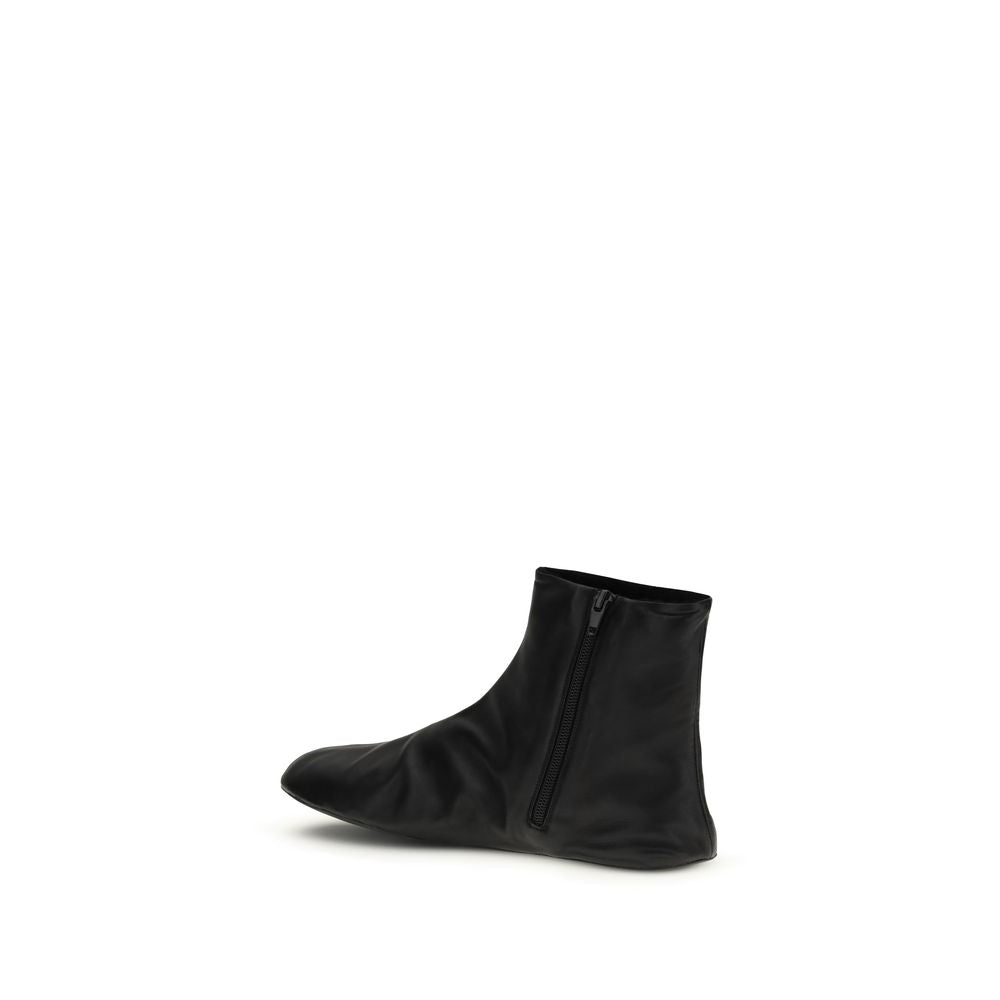 The Row Upper: 100% Lamb leather; Sole: 100% Rubber; Lining: Shearling ankle boot in black — view 3