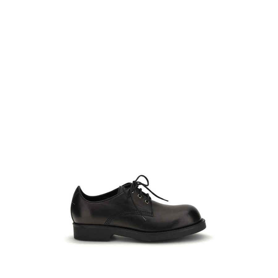 MM6 Maison Margiela 100% Calf Leather Bos Taurus flat in black