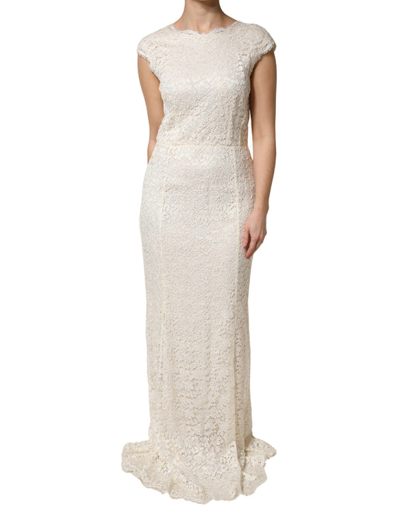 Dolce & Gabbana 75% Viscose 25% Nylon; Lining: 86% Silk 8% Cotton 4% Elastane 2% Nylon dress in white
