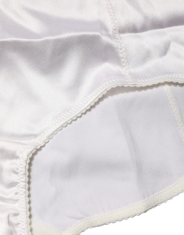 Dolce & Gabbana 94% Silk 6% Elastane; Lining: 90% Nylon 10% Elastane high-waist girdle panty in white