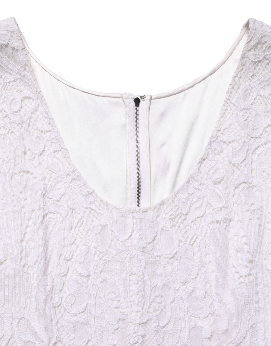 Dolce & Gabbana 75% Viscose 25% Nylon; Lining: 86% Silk 8% Cotton 4% Elastane 2% Nylon dress in white