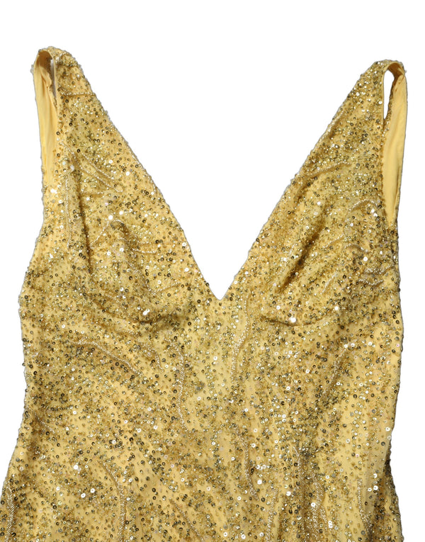 Dolce & Gabbana 60% Glass gown in gold
