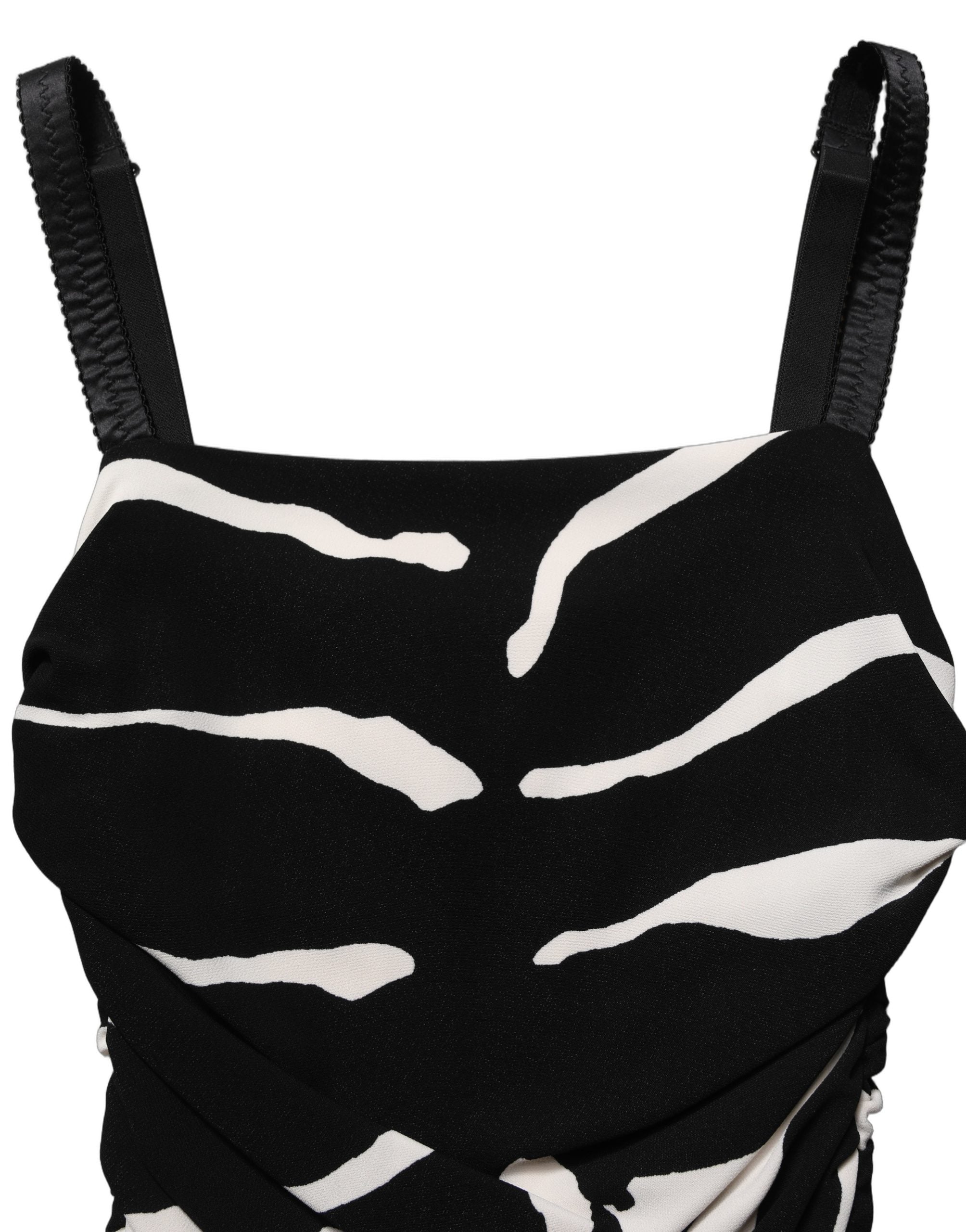 Dolce & Gabbana 95% Viscose 5% Spandex; lining 91% Silk 9% Spandex dress in black
