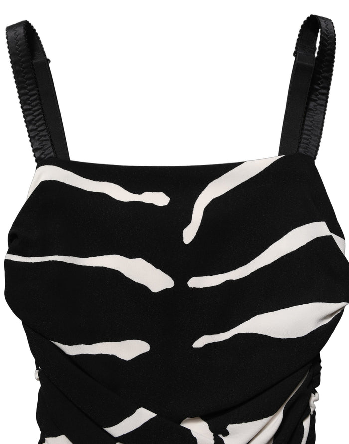 Dolce & Gabbana 95% Viscose 5% Spandex; lining 91% Silk 9% Spandex dress in black