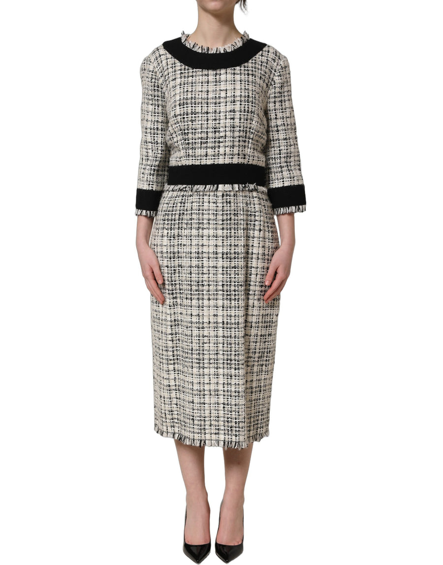 Dolce & Gabbana 33% Cotton 25% Wool 16% Acrylic 9% Polyester 8% Alpaca 6% Mohair 3% Nylon; Lining: 53% Cotton 26% Nylon 21% Elastane dress in multicolor