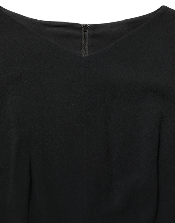Dolce & Gabbana 51% Viscose 46% Acetate 3% Elastane; Lining: 93% Silk 7% Elastane dress in black