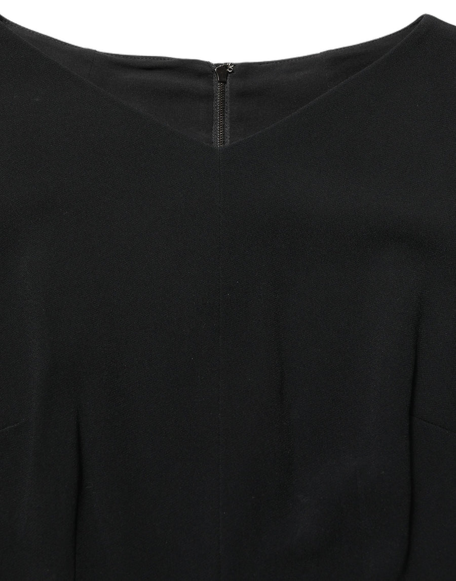 Dolce & Gabbana 51% Viscose 46% Acetate 3% Elastane; Lining: 93% Silk 7% Elastane dress in black