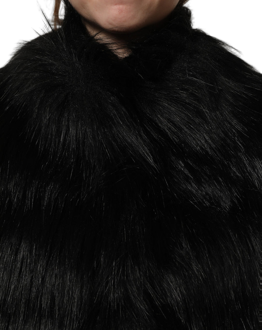 Dolce & Gabbana 58% Acrylic 30% Modacrylic 12% Polyester; Lining: 67% Polyester 9% Virgin Wool 3% Elastane 1% Cashmere vest in black
