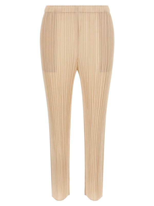 Pleats Please Issey Miyake 100% Polyester trousers in beige
