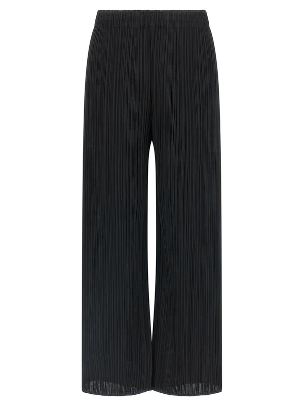 Pleats Please Issey Miyake 100% Polyester trousers in black
