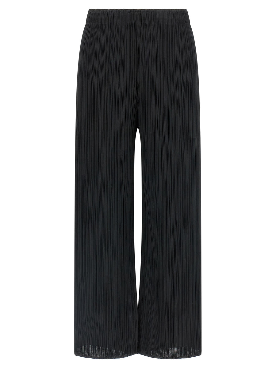 Pleats Please Issey Miyake 100% Polyester trousers in black