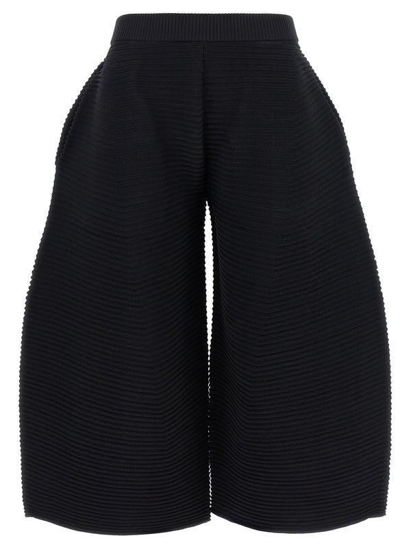 Issey Miyake 48% polyester trousers in black